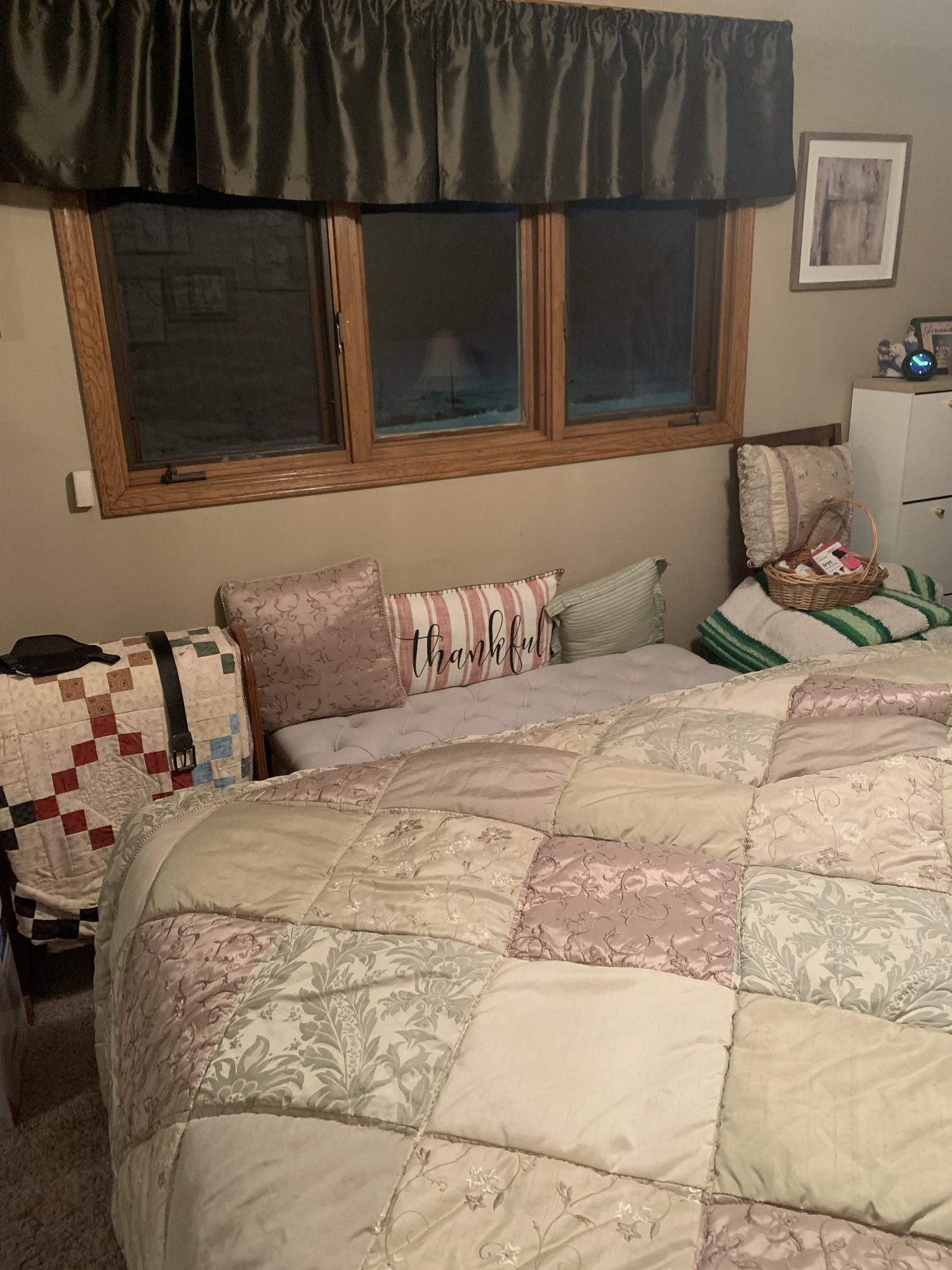 Bedroom converted to a medium isolation booth with a sound-absorbing bed