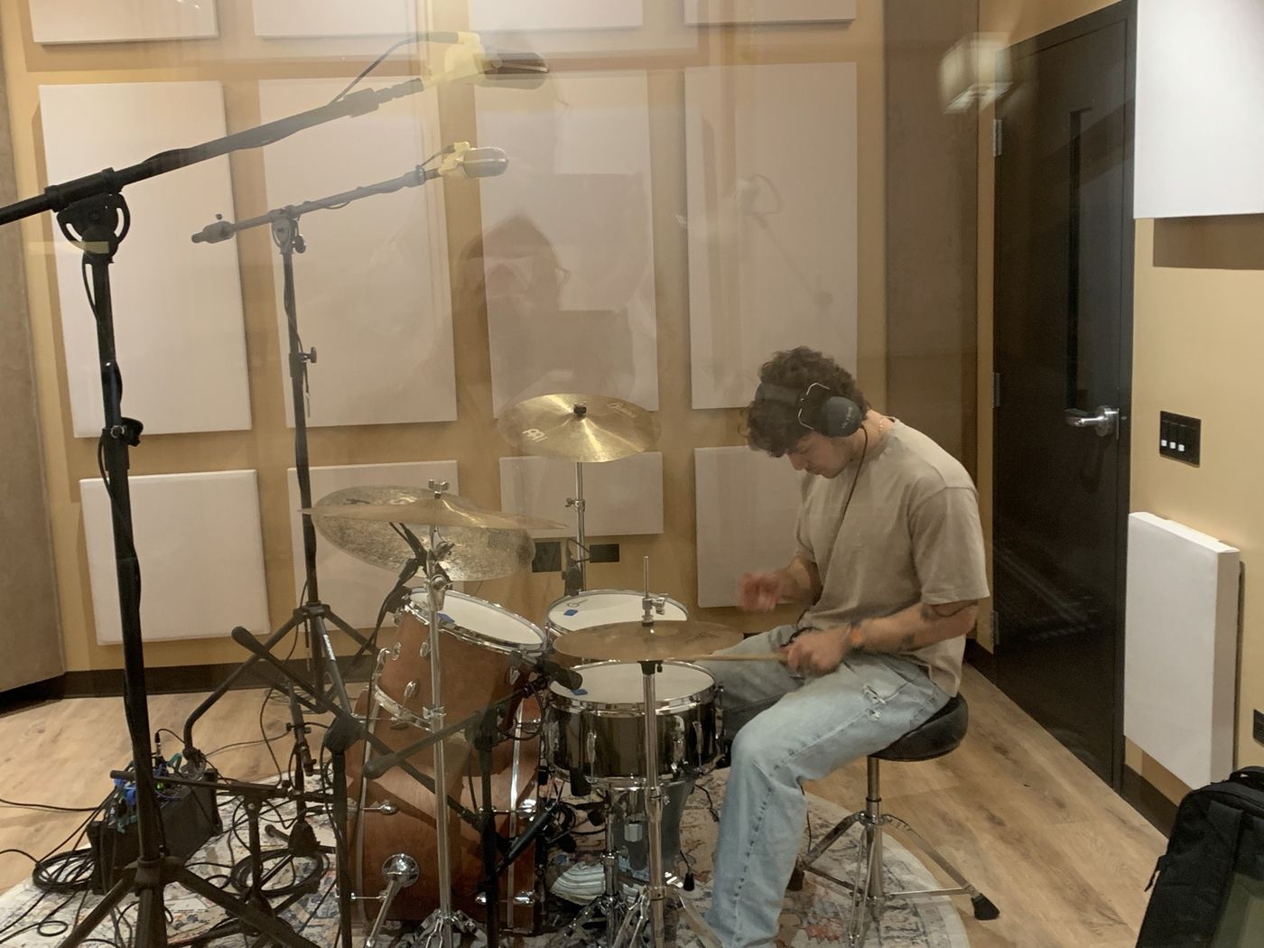 A drummer tracking during the session.